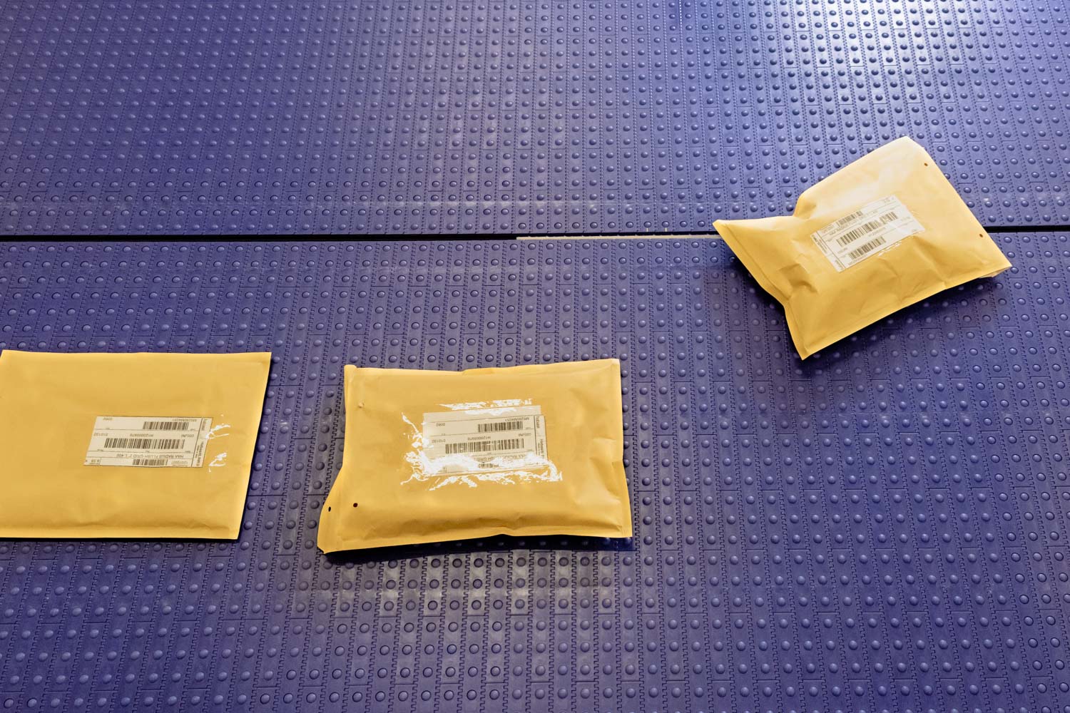 envelopes on conveyor belt